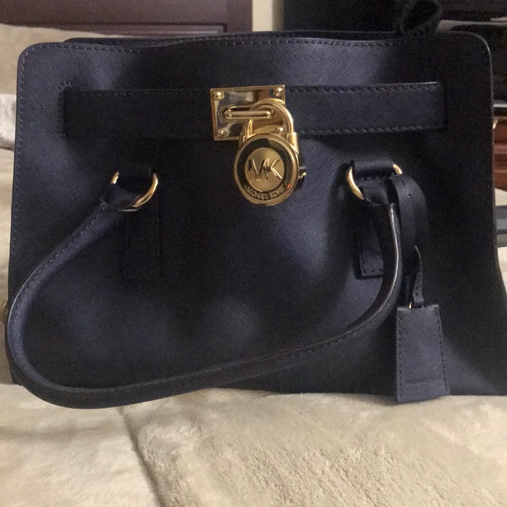 MichaelKors satchel. Never used